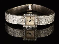 Piaget 18ct white gold ladies wristwatch with blued hands, Roman numerals, silver dial, diamond