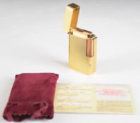 St Dupont gold plated lighter with textured finish, ref 14301 with After Service Guarantee Card.