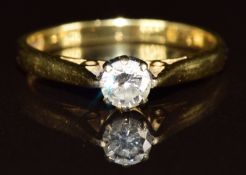 An 18ct gold ring set with a round cut diamond of approximately 0.15ct, 2g, size H
