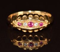 An 18ct gold ring set with rubies and diamonds, Chester 1915, 2.3g, size M
