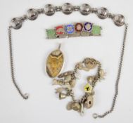 A silver necklace by COF Denmark, silver charm bracelet, enamel bracelet and silver pendant set with