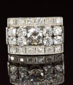 An 18ct gold white gold ring set with round cut diamonds, the centre diamond 0.54ct, total diamond