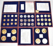 Five gold plated picture coin sets relating to aviation and steam, to include Concorde, RAF etc
