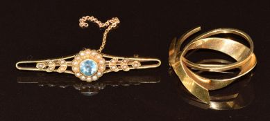 A 15ct gold brooch set with topaz and seed pearls (3.6g, 4.2cm) and a 9ct gold brooch (3.7g, 2.5cm)