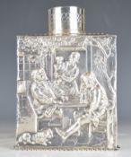 Victorian hallmarked silver tea caddy with embossed decoration of continental interior scenes with