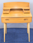 Ercol 1960s / mid century modern light elm desk model 437, with raised fitted drawers, cubby hole