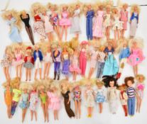 Forty vintage and modern Barbie and Sindy dolls.