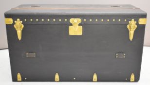 Louis Vuitton motoring trunk, with named catches and studs, opening to reveal three slide out