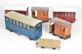 Two various Mamod 32mm garden railway guard's vans together with three various kit and scratch built