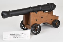 Prize winning exhibition quality model of a 12lb cast iron gun or cannon, on cast iron garrison
