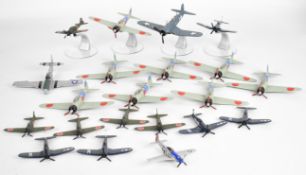 Twenty-one Corgi diecast model fighter planes to include Mitsubishi Zero and F4U Corsair