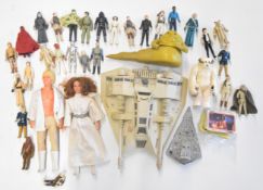 Thirty vintage Kenner Star Wars action figures to include Luke Skywalker (Hoth), Chewbacca, Princess
