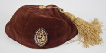 Uppingham school cap, in framed display