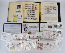 A box containing an album of King George V - Queen Elizabeth II with WMK varieties, an album of GB