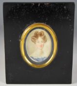 19th century portrait miniature on ivory of a lady in lace and blue dress with pearl earrings,