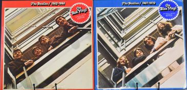 The Beatles 1962-1966 on red vinyl and The Beatles 1967-1970 on blue vinyl, both appear VG+
