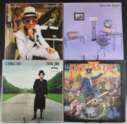 Thirty four mixed Rock and Pop LPs including Elton John, Rowan Atkinson, Bryan Ferry, Otis