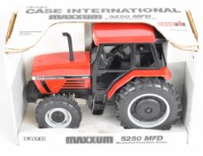 Ertl Case International Maxxum 5250 MFD 1/18 scale diecast model tractor with red body and black