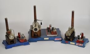 Wilesco D12 live steam stationary engine comprising boiler with weight type safety valve,