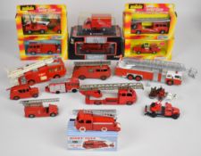 Sixteen diecast model fire engines including vintage Dinky examples, some in original boxes.