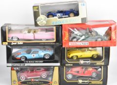 Seven 1:18 scale diecast model sports cars by Burago, Maisto and similar to include Ford GT,