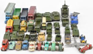 Forty-five vintage Dinky and Corgi diecast model cars, trucks and military vehicles.