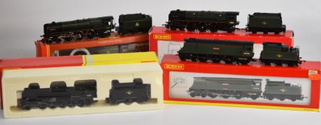 Four Hornby 00 gauge model railway locomotives comprising BR 9F No.92221 R2880, BR Class 7MT '
