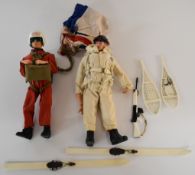 Two vintage Action Man figures together with Red Devil and Ski Patrol outfits and accessories