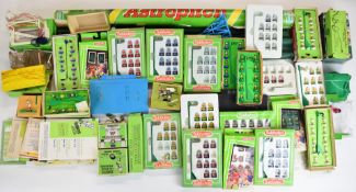 A collection of Subbutteo items to include teams, pitch, goals, score board, corner kickers,