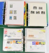 A mint and used GB stamp collection in six folders and a stockbook, including first day covers and