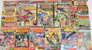 Ninety-four Bronze Age Marvel comics to include The Inhumans, Tarzan, Team America, The Son of Satan