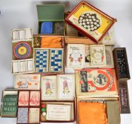 A collection of early twentieth century puzzle and parlour games including Who Knows, The Pudding