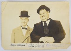Stan Laurel and Oliver Hardy signed / autographed promotional photograph with dedication 'Hello,