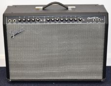 Fender Champion 100 guitar amplifier, with foot switch and original owner's manual, serial number