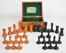Late Victorian Jaques & Son Staunton Chessmen boxwood and ebony chess set, height of King 9cm, in