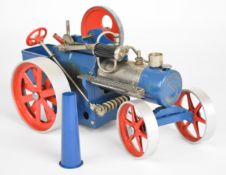 Wilesco live steam traction engine, the single cylinder having slip eccentric reversing