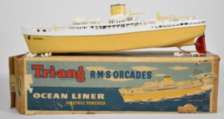 Tri-ang R.M.S. Orcades electric powered ocean liner with yellow hull, white deck and red