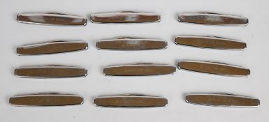 Twelve advertising folding pocket knives, engraved for The Famous Cheltenham, Guards sole agents,