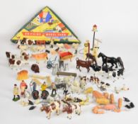 A large collection of post war Britains Farm metal figures, animals and equipment to include