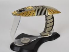 Franklin Mint Star Trek metal and resin Cardassian Disruptor weapon on stand, H16 x L23cm