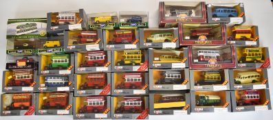 Thirty-four Corgi diecast model buses and trams to include Thornycroft, Bedford and AEC, all in
