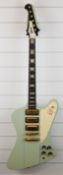 1991 Gibson Firebird Custom Shop Edition finished in Frost-Blue with gold hardware, made in the USA,