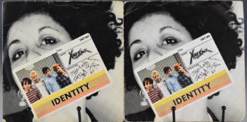 X-Ray Spex - Identity b/w Let's Submerge (INT 563) on pink vinyl together with a black vinyl copy,