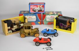 Five Schuco modern clockwork tinplate cars comprising Mercedes Grand Prix 1936 1050 x2, Ford Coupé