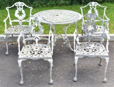 Cast pierced metal garden or conservatory table and four chairs, diameter 80cm