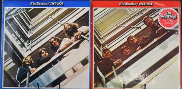 The Beatles - Two coloured vinyl double albums comprising 1962-1966 (PCSP 717) red vinyl and 1967-