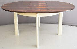 Danish rosewood extendable dining table. Vendor advises the table was purchased by their parents