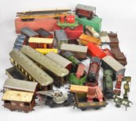 A collection of Hornby clockwork 0 gauge model railway engines and carriages to include LMS 5600