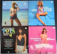 Thirty one Klaus Wunderlich LPs, many with cheesecake covers and three with promotional pamphlets,