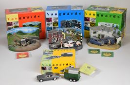 Four Lledo Vanguards 1:43 scale dicast model car boxed sets comprising Mini Cooper Racing Diorama